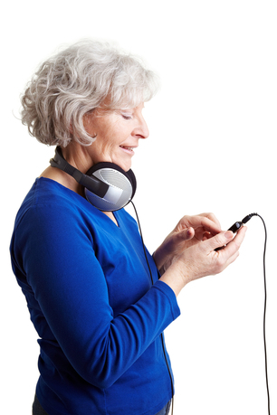 senior-woman-with-headphones-making-selection-on-ipod