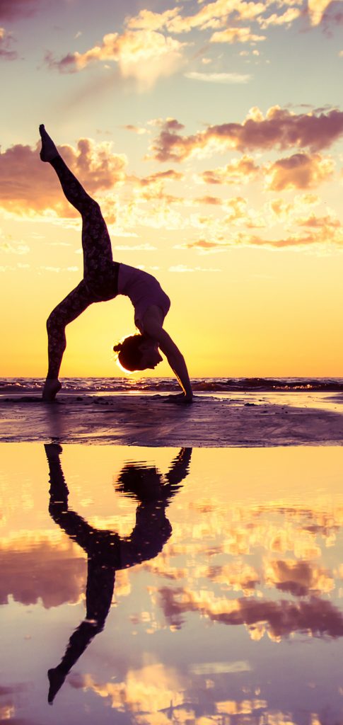 woman practicing yoga